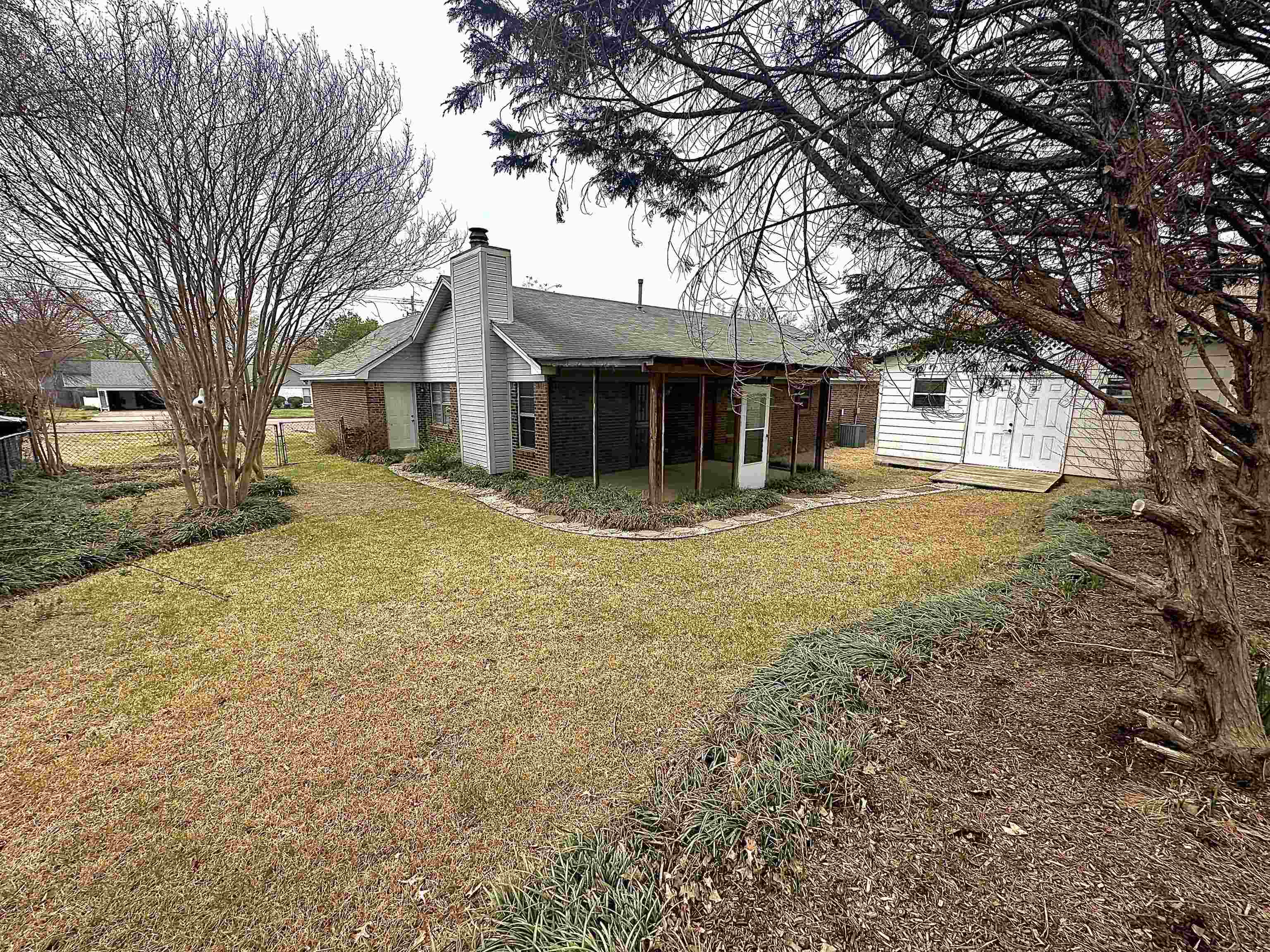 3250 Altruria Road Bartlett, TN 38134 - Photo 26 of 31 a front view of house with yard and trees