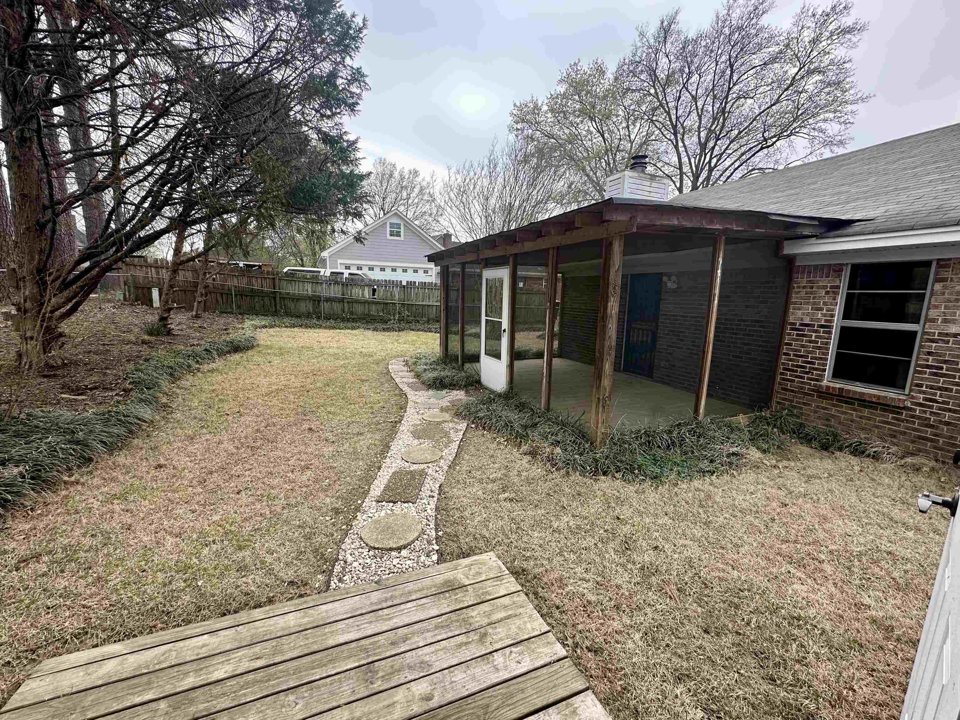3250 Altruria Road Bartlett, TN 38134 - Photo 31 of 31 a view of a backyard with a patio