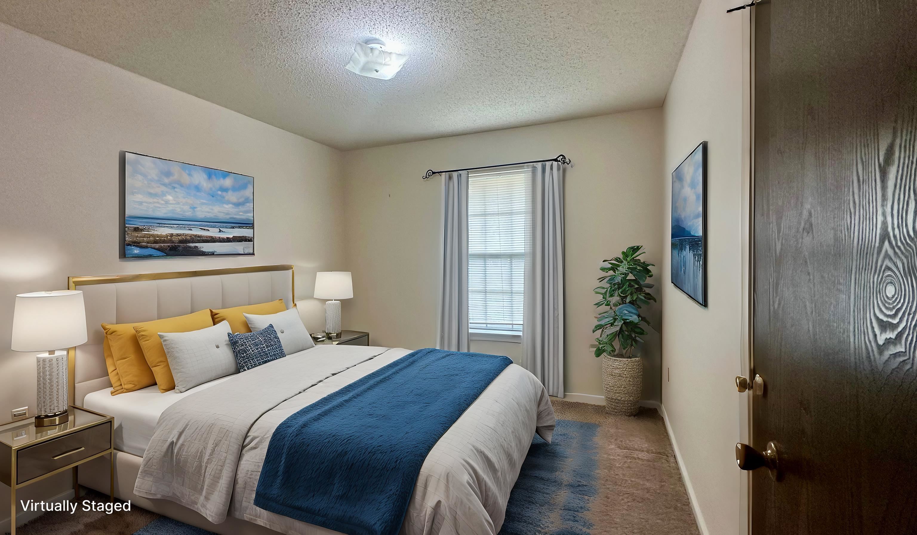 3250 Altruria Road Bartlett, TN 38134 - Photo 9 of 31 a bedroom with bed and a potted plant