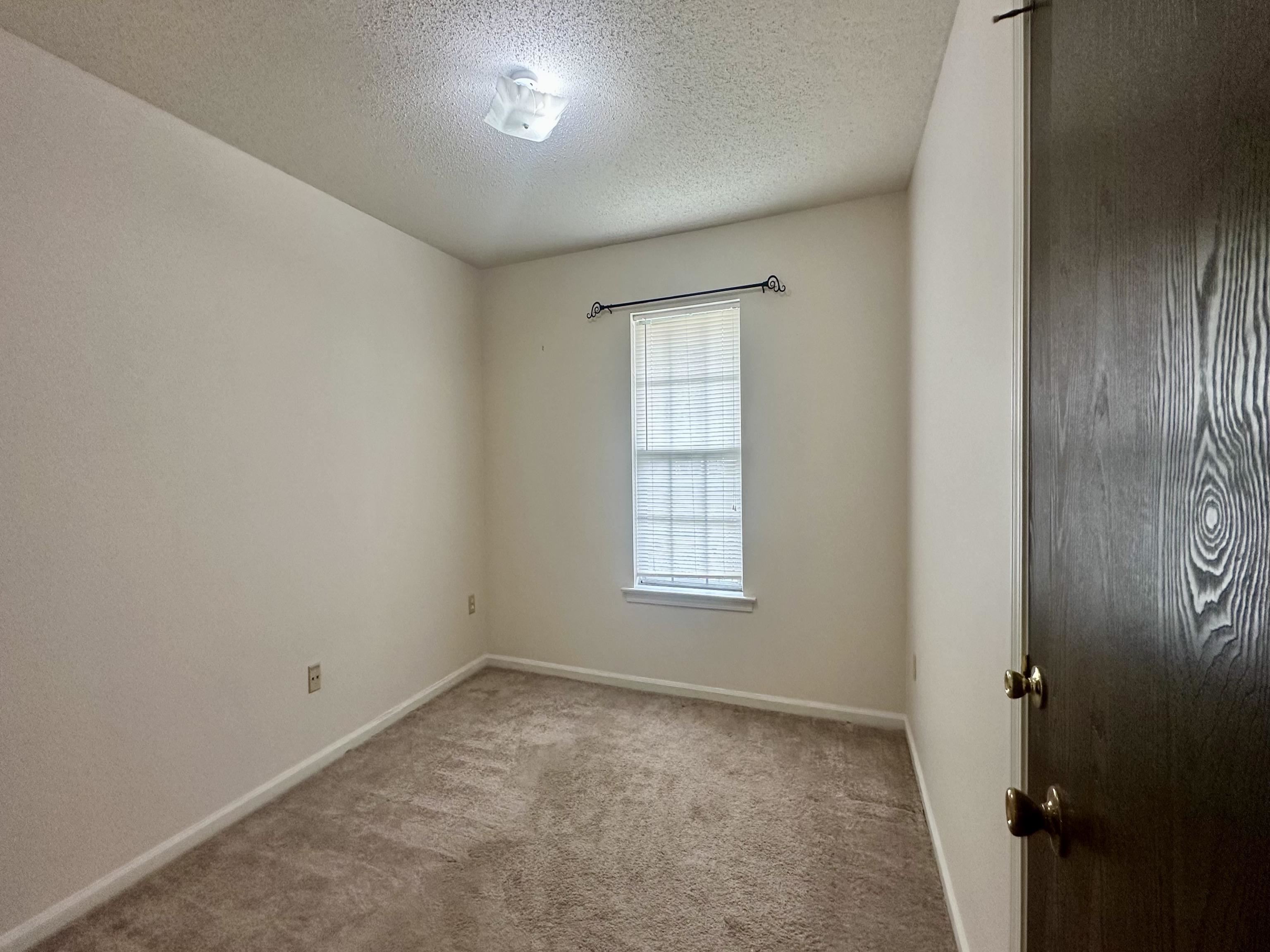 3250 Altruria Road Bartlett, TN 38134 - Photo 10 of 31 an empty room with windows