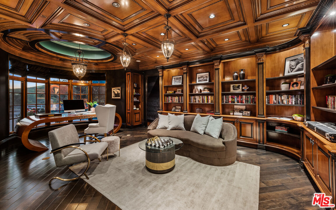25220 Walker Road Hidden Hills, CA 91302 - Photo 16 of 29 a living room with furniture and a flat screen tv
