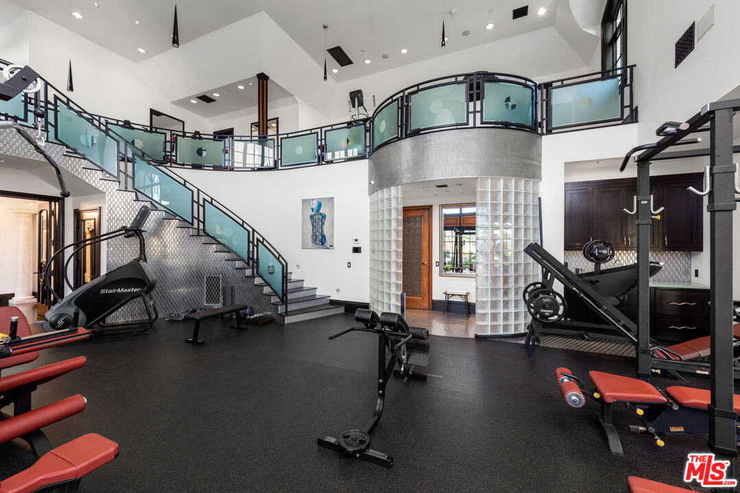 25220 Walker Road Hidden Hills, CA 91302 - Photo 22 of 29 a view of a room with gym equipment