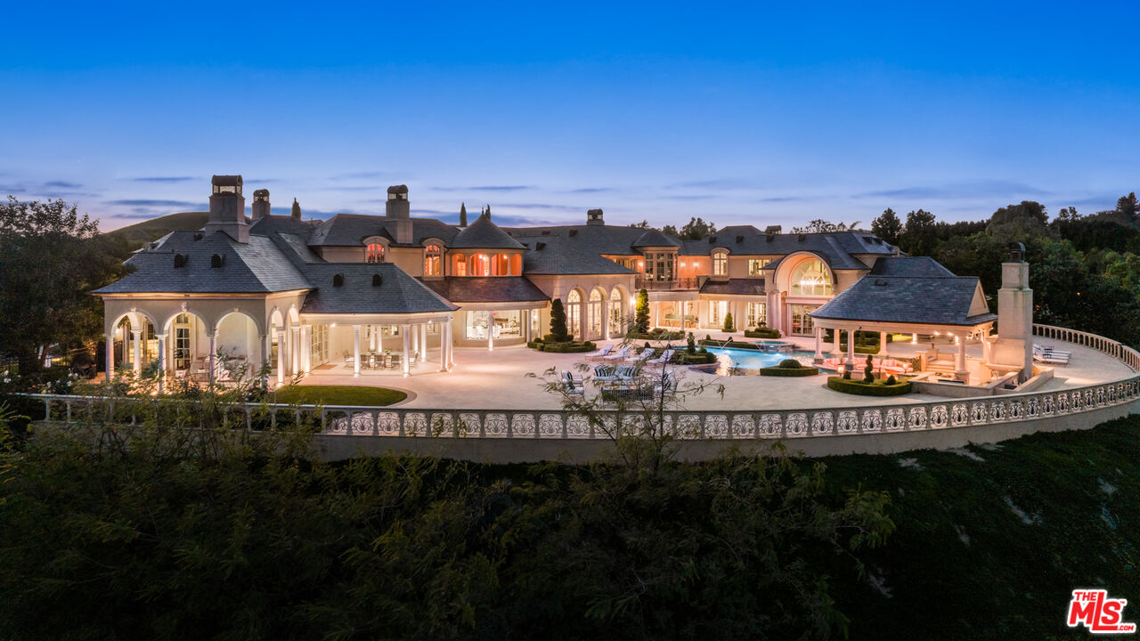 25220 Walker Road Hidden Hills, CA 91302 - Photo 28 of 29 a view of a house with outdoor space and sitting area