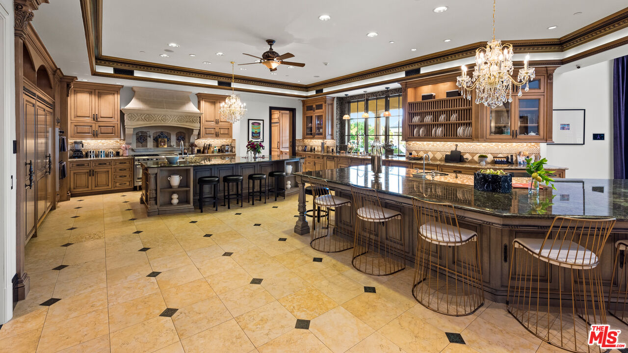 25220 Walker Road Hidden Hills, CA 91302 - Photo 6 of 29 a kitchen with lots of counter top space