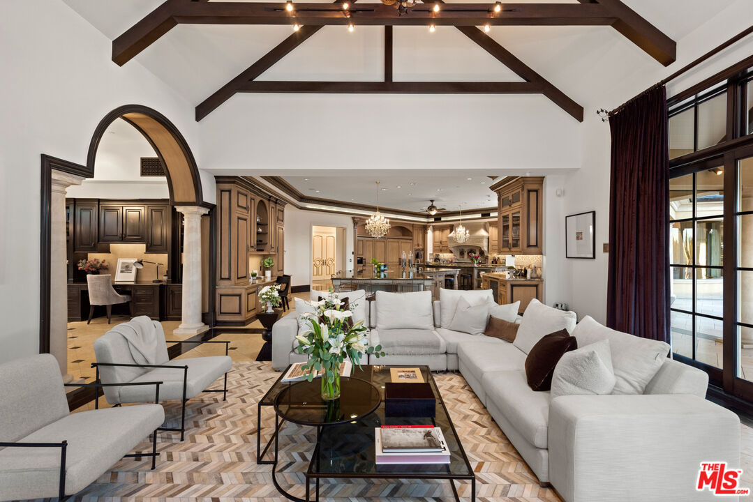 25220 Walker Road Hidden Hills, CA 91302 - Photo 8 of 29 a living room with furniture or couch and a window