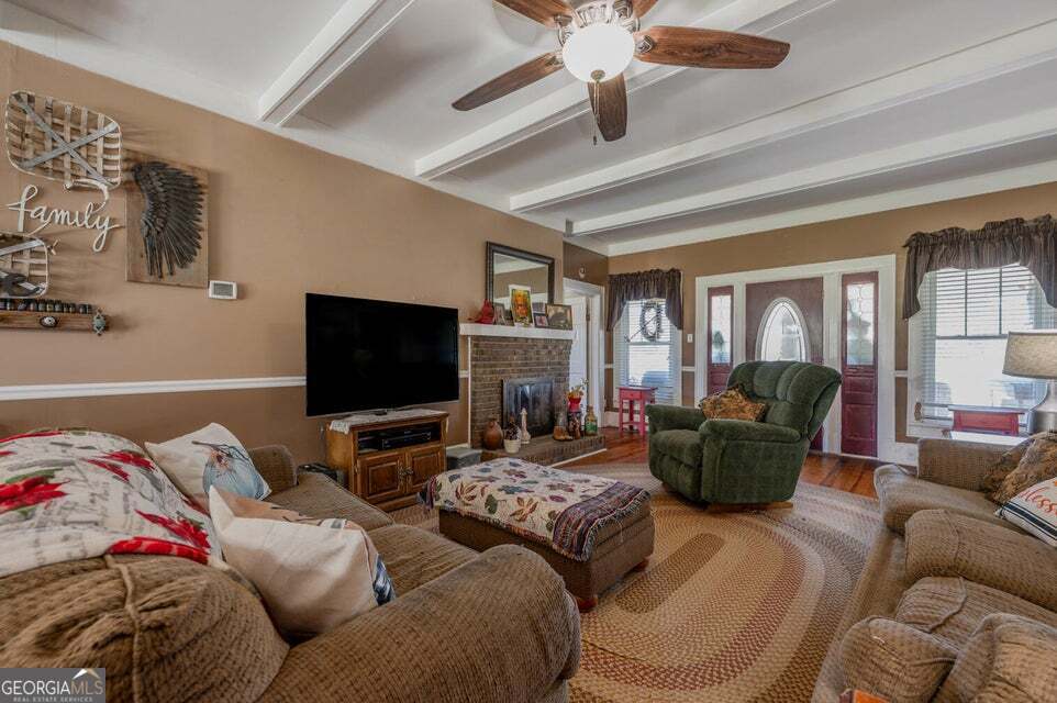 69 Myers Avenue Trion, GA 30753 - Photo 11 of 51 a living room with furniture and a flat screen tv