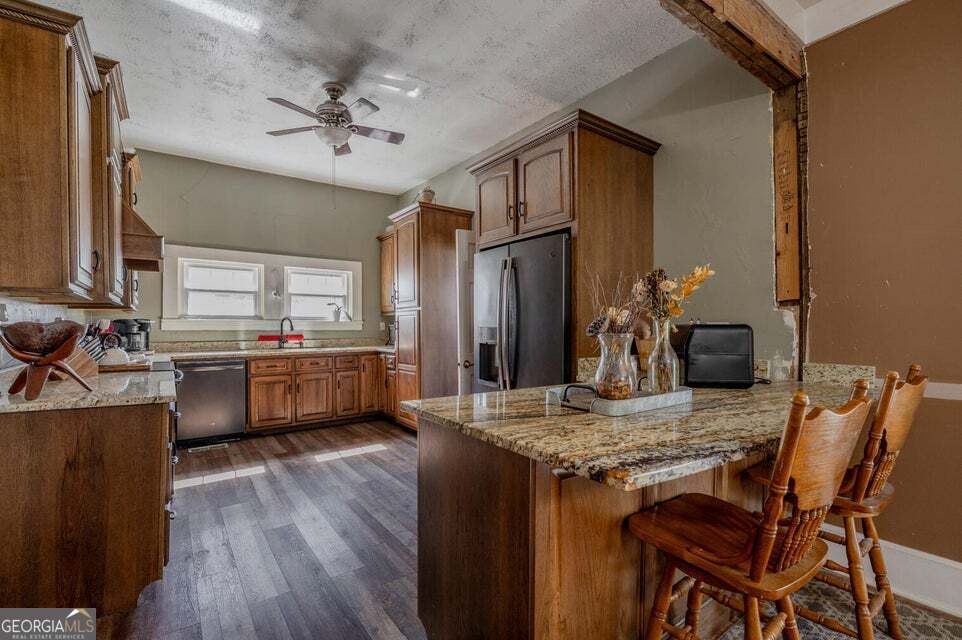 69 Myers Avenue Trion, GA 30753 - Photo 16 of 51 a kitchen with a table and chairs in it