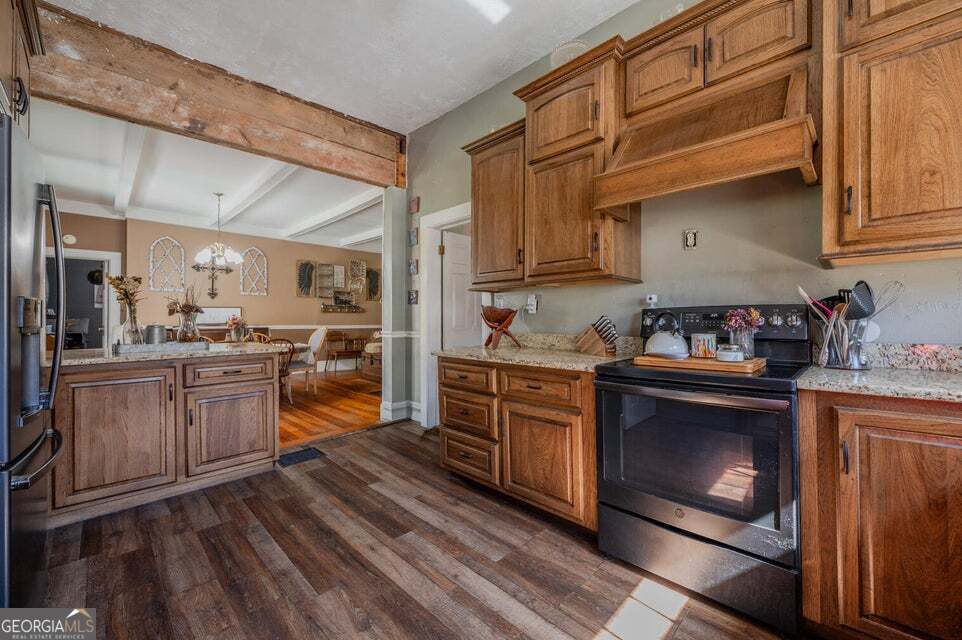 69 Myers Avenue Trion, GA 30753 - Photo 19 of 51 a kitchen with sink a stove and cabinets