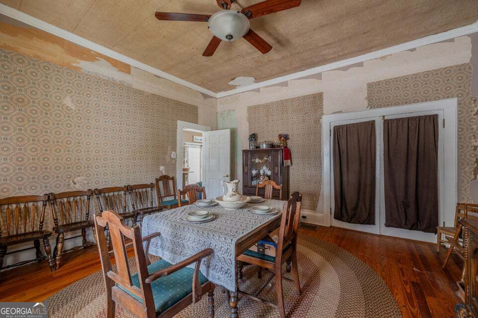 69 Myers Avenue Trion, GA 30753 - Photo 21 of 51 a view of a dining room with furniture and a chandelier fan