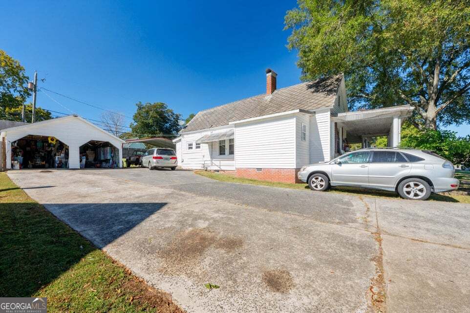 69 Myers Avenue Trion, GA 30753 - Photo 38 of 51 a view of a car parked in front of a house