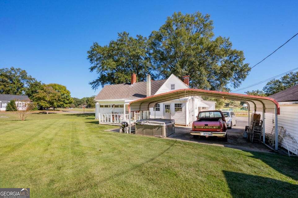 69 Myers Avenue Trion, GA 30753 - Photo 39 of 51 a front view of a house with swimming pool having outdoor seating