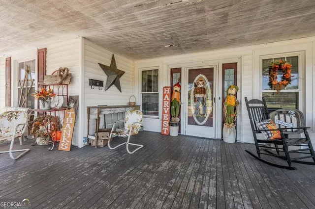 a view of a livingroom with furniture and furniture