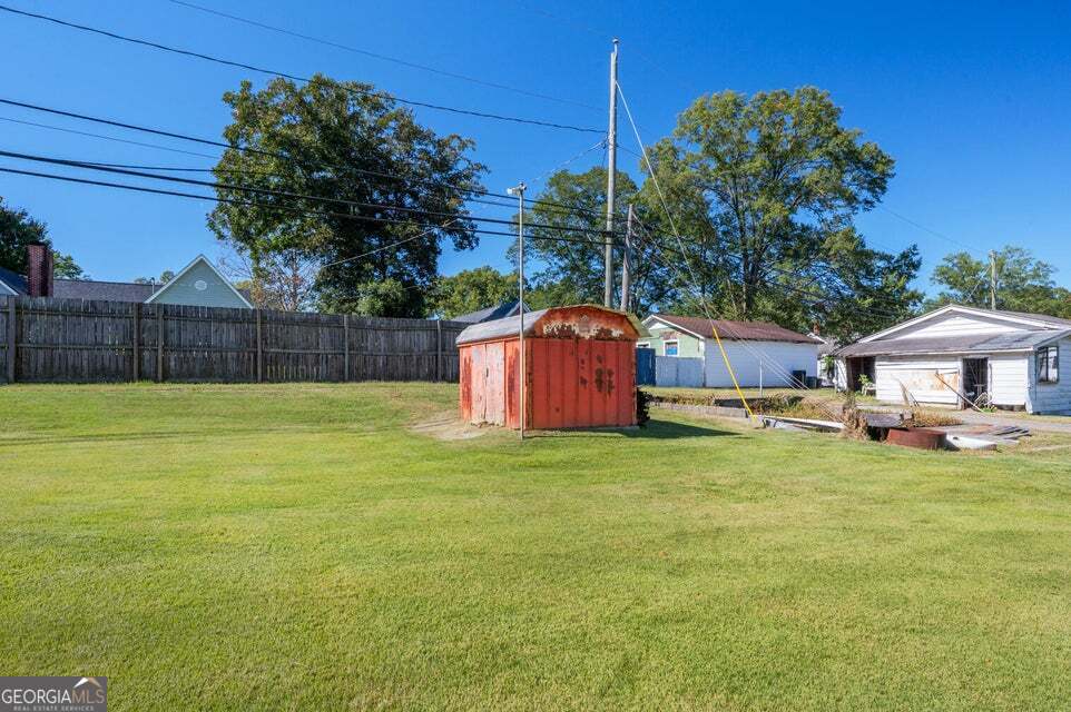 69 Myers Avenue Trion, GA 30753 - Photo 41 of 51 a swimming pool with wooden fence