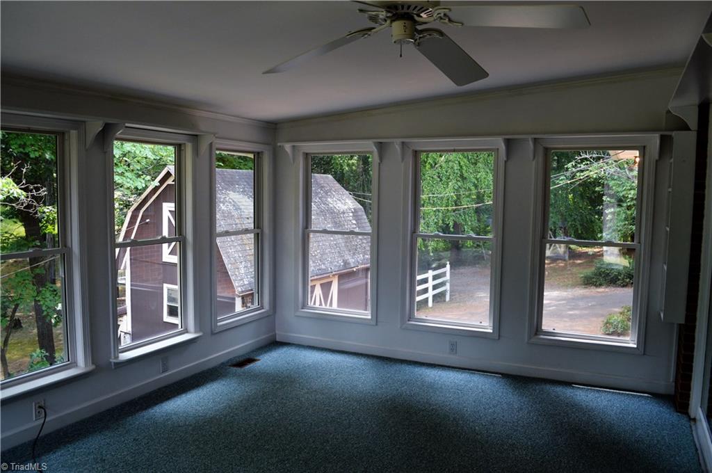 260 Lake Leonard Road Lexington, NC 27295 - Photo 12 of 29 Sunroom overlooking backyard.