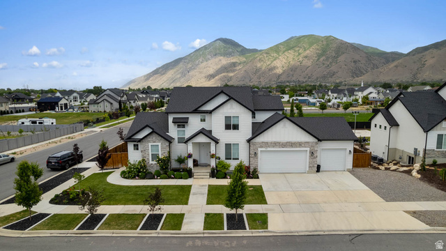 500 North 516th Street West, Unit 19 Mapleton, UT 84664 - Photo 31 of 41 Bring the toys! The three-car garage and extra-wide driveway provide plenty of room for RVs, trailers, boats, and other recreational vehicles.