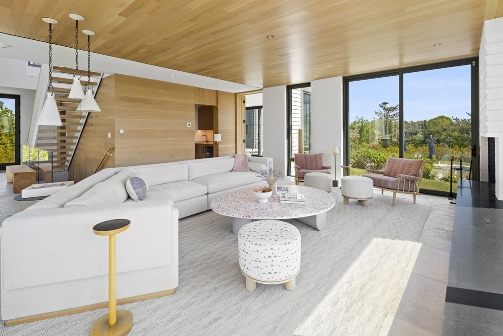 178 Queen Anne Road Chatham, MA 02633 - Photo 11 of 33 a living room with furniture and a large window