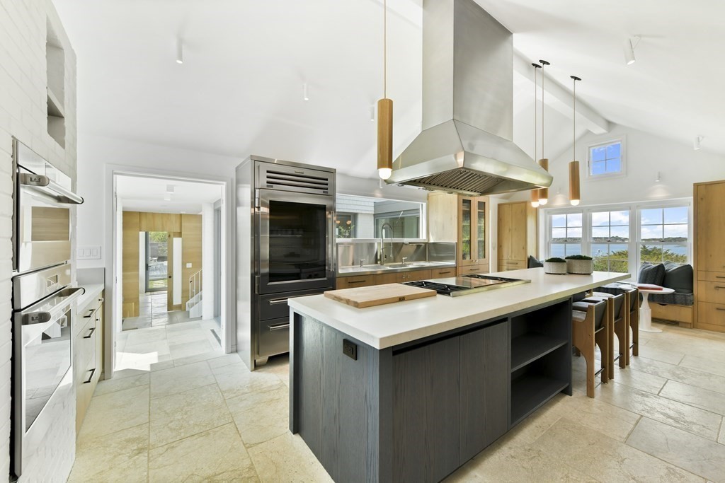 178 Queen Anne Road Chatham, MA 02633 - Photo 13 of 33 a kitchen with stainless steel appliances granite countertop a stove and a sink