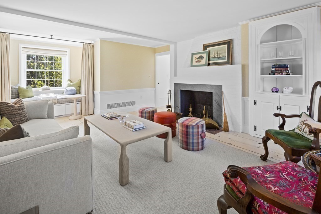 178 Queen Anne Road Chatham, MA 02633 - Photo 19 of 33 a living room with furniture and a fireplace