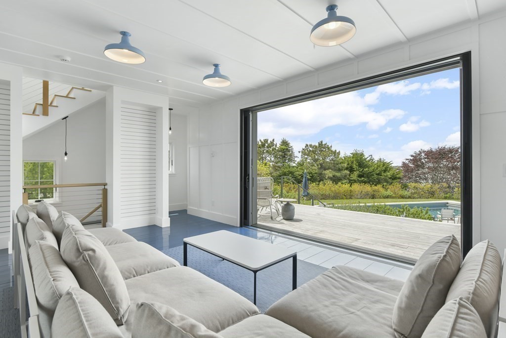 178 Queen Anne Road Chatham, MA 02633 - Photo 28 of 33 a living room with furniture and a large window