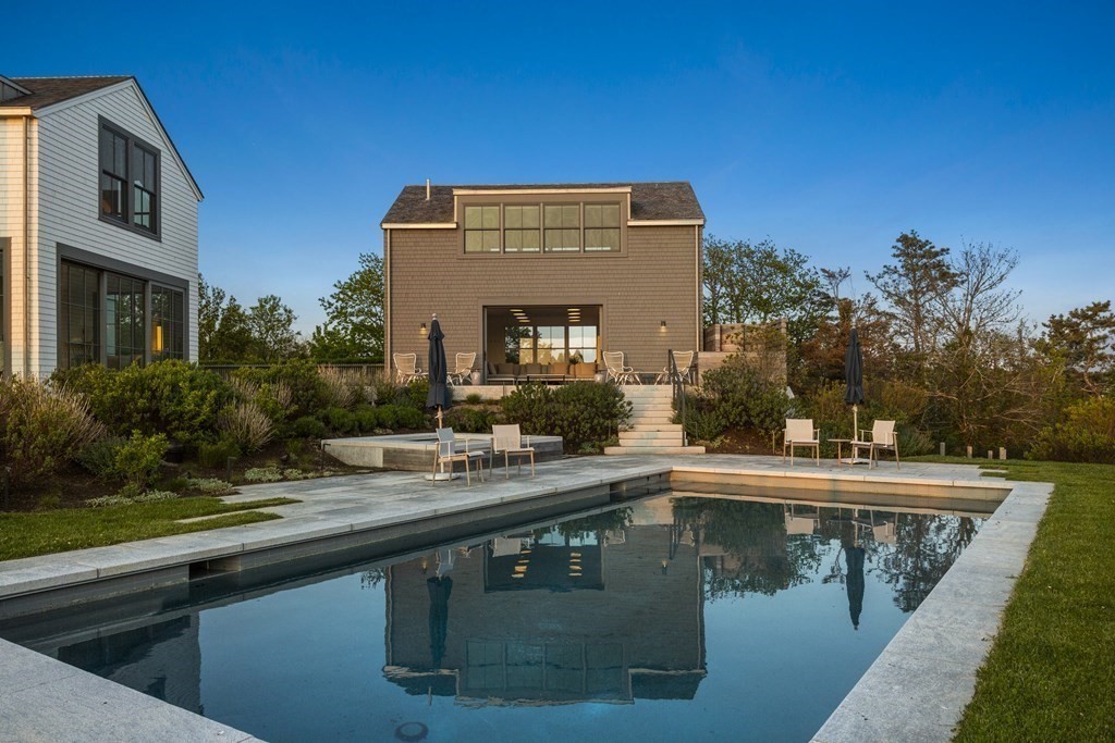 178 Queen Anne Road Chatham, MA 02633 - Photo 3 of 33 a view of a lake with a building in the background