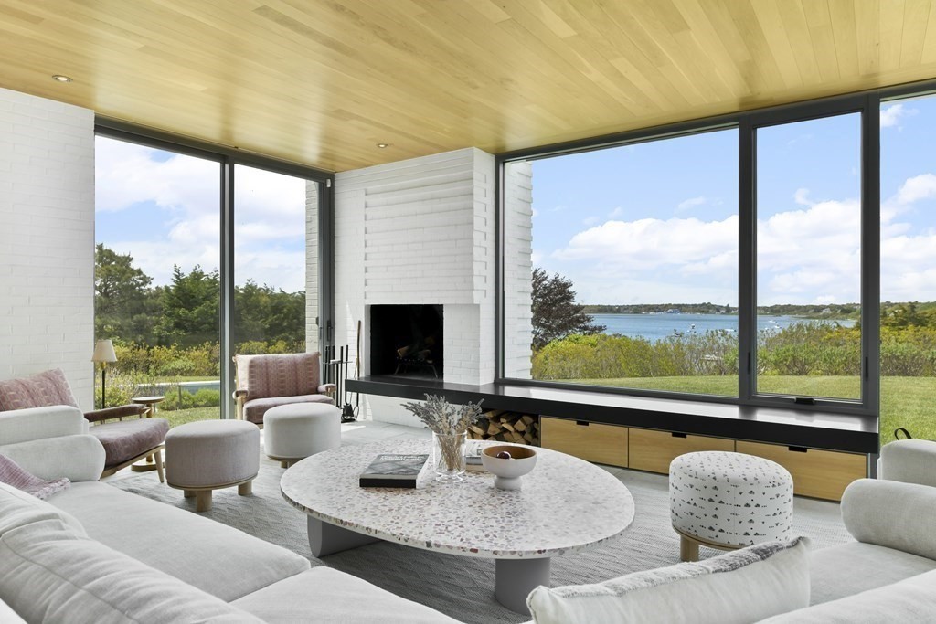178 Queen Anne Road Chatham, MA 02633 - Photo 10 of 33 a living room with furniture and a large window