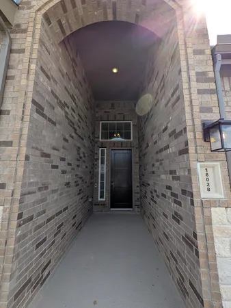 a view of a brick wall of the building