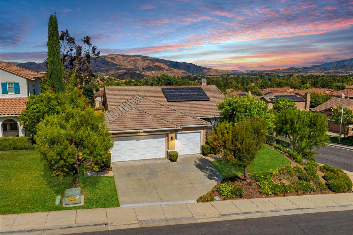 23732 Bella Vista Road Corona, CA 92883 - Photo 4 of 49 an aerial view of a house with a yard
