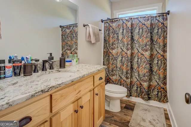 a view of a lake with a yard