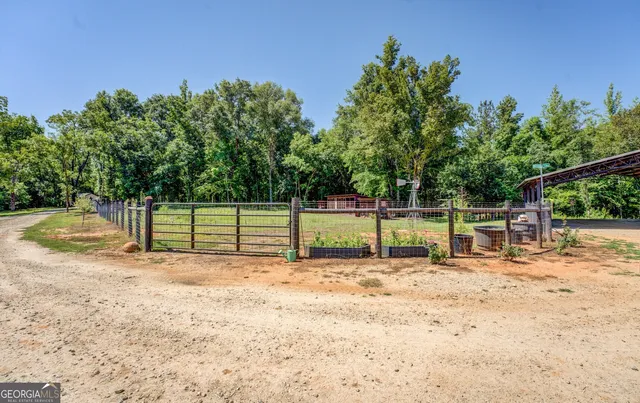 a backyard of a house with lots of green space