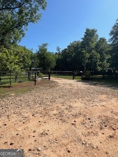 4348 Marshall Stewart Road Crawfordville, GA 30631 - Photo 73 of 80 a backyard of a house with lots of green space