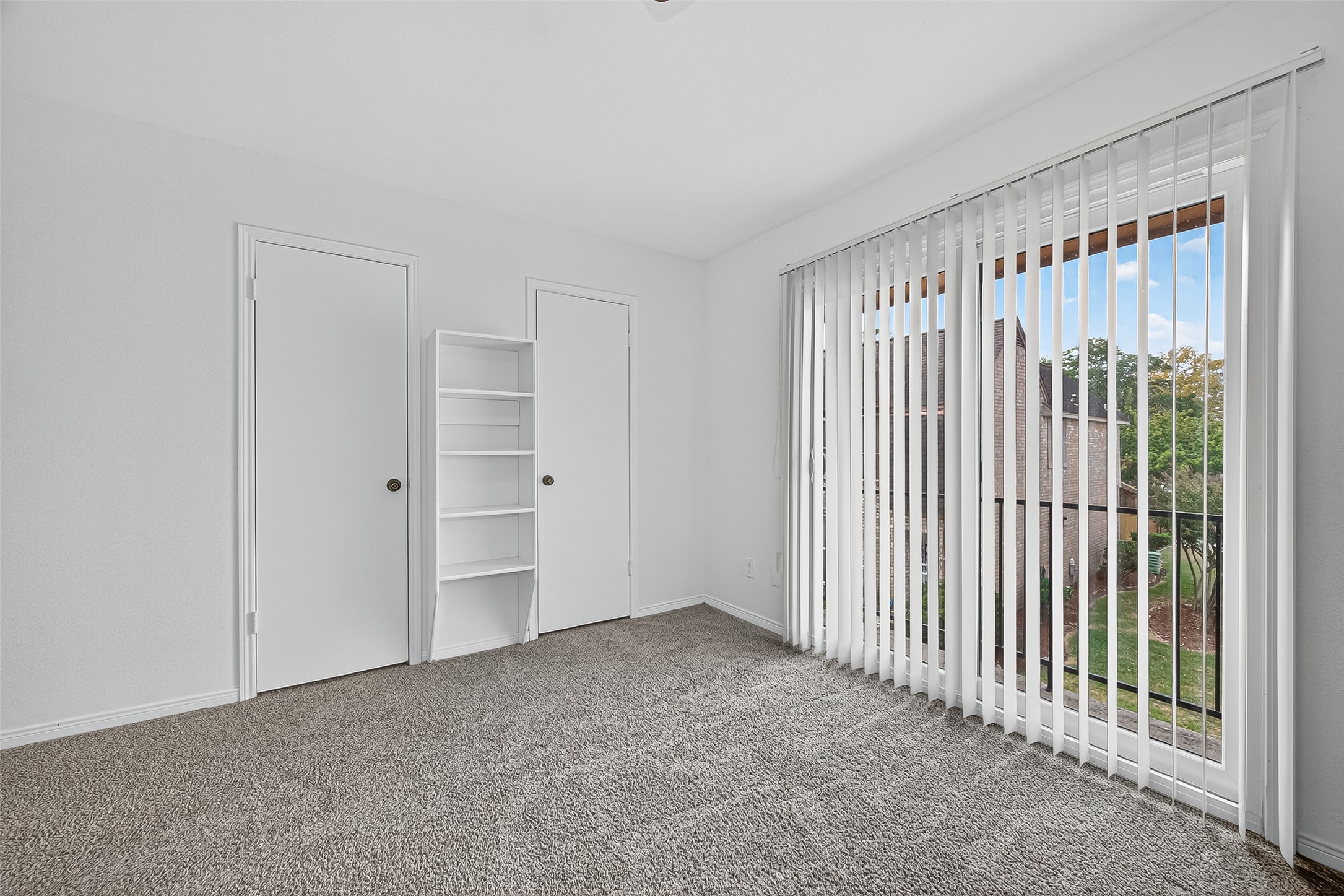 830 Threadneedle Street, Unit 240 Houston, TX 77079 - Photo 19 of 31 a view of an empty room with a window