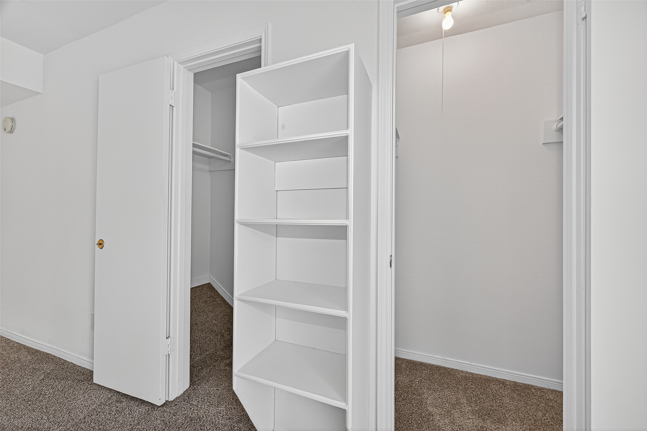 830 Threadneedle Street, Unit 240 Houston, TX 77079 - Photo 21 of 31 a view of walk in closet with empty racks