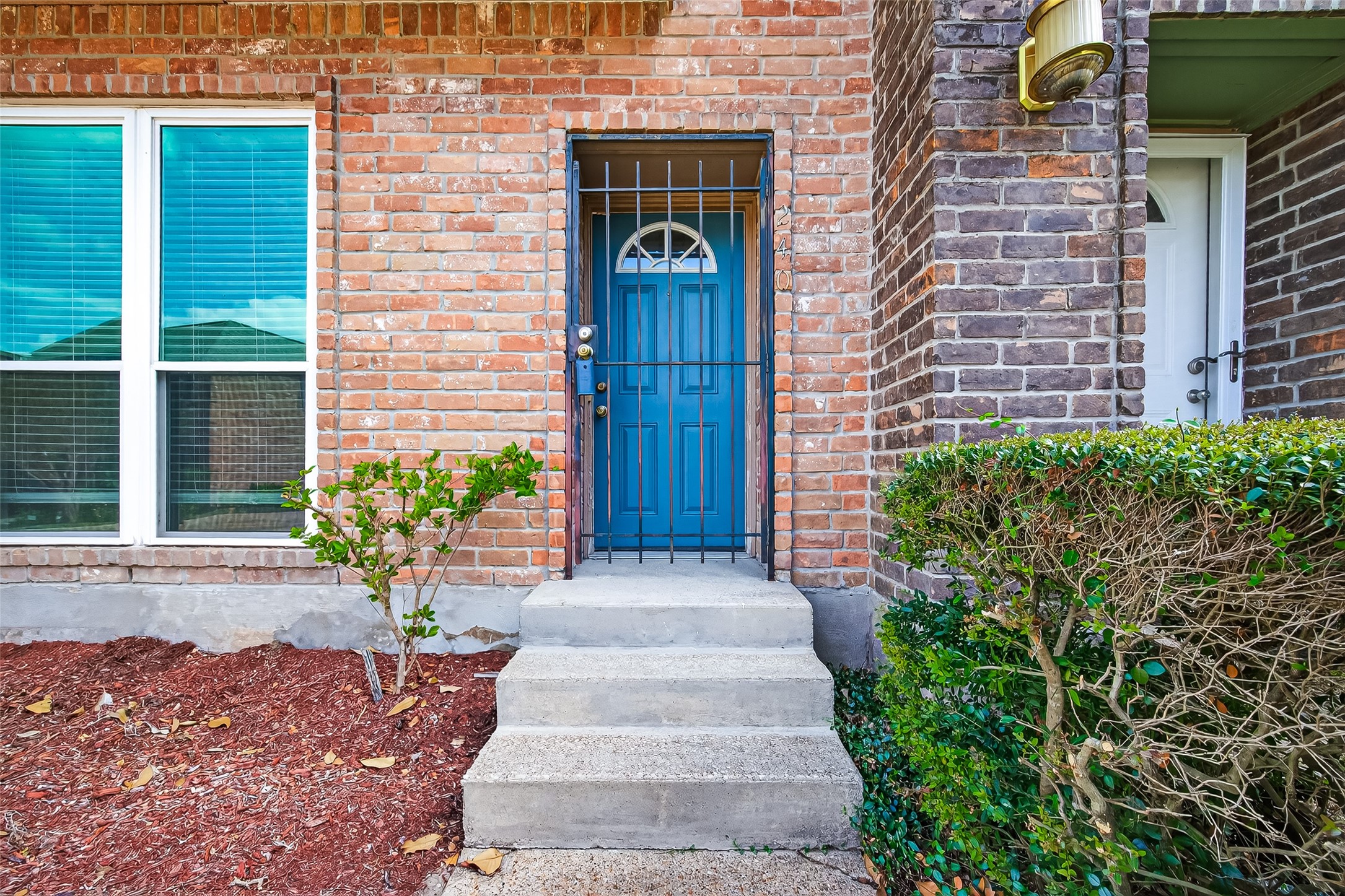 830 Threadneedle Street, Unit 240 Houston, TX 77079 - Photo 24 of 31 a front view of a house with a yard