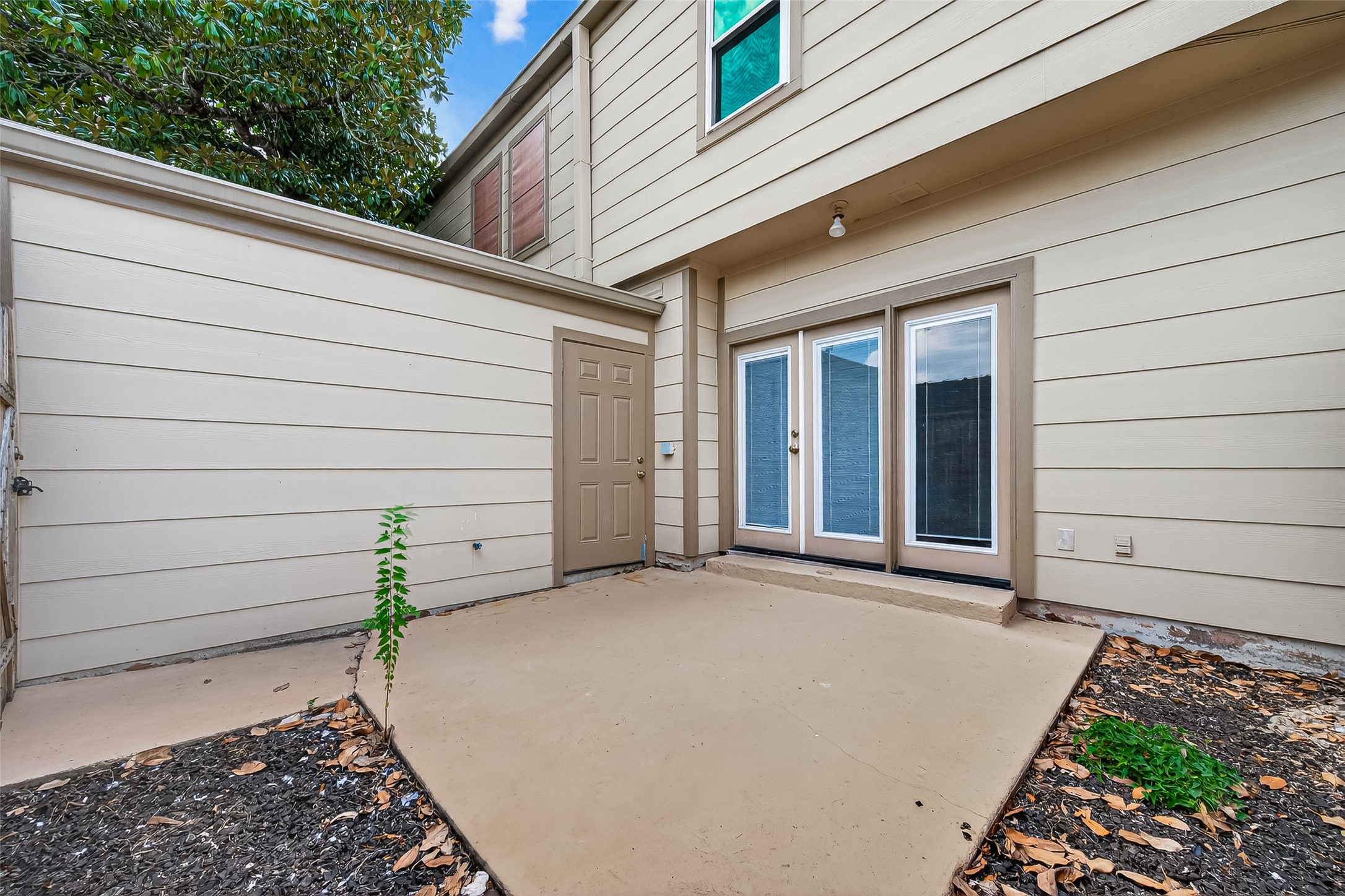 830 Threadneedle Street, Unit 240 Houston, TX 77079 - Photo 26 of 31 a view of a house with a garage