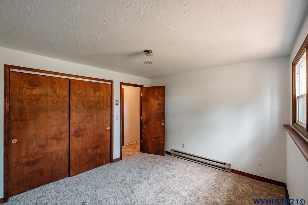 1278 Southwest Maple Street Dallas, OR 97338 - Photo 25 of 42 an empty room with windows