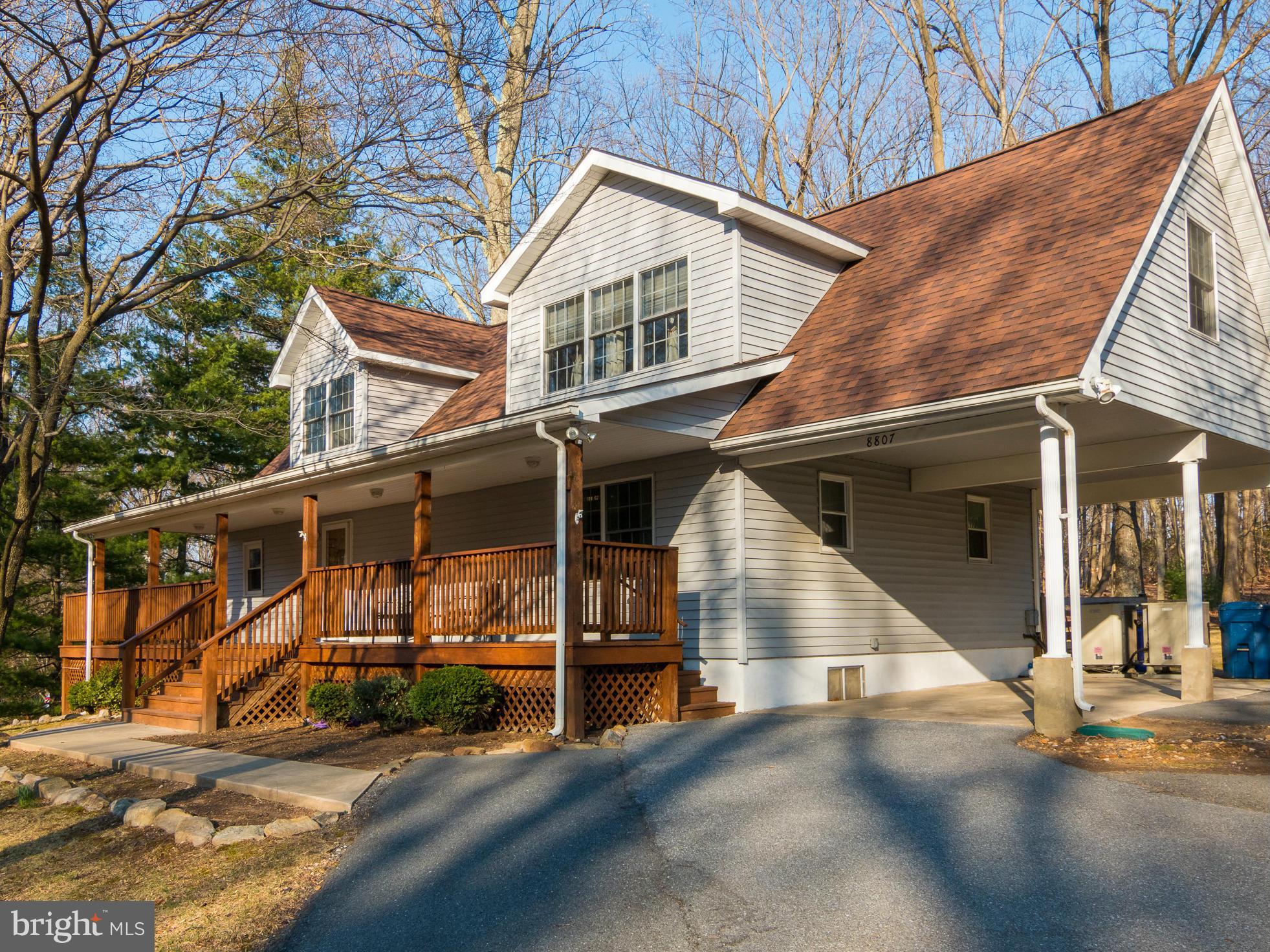 8807 Indian Springs Road Frederick, MD 21702 - Photo 1 of 27 a view of a house with a garage