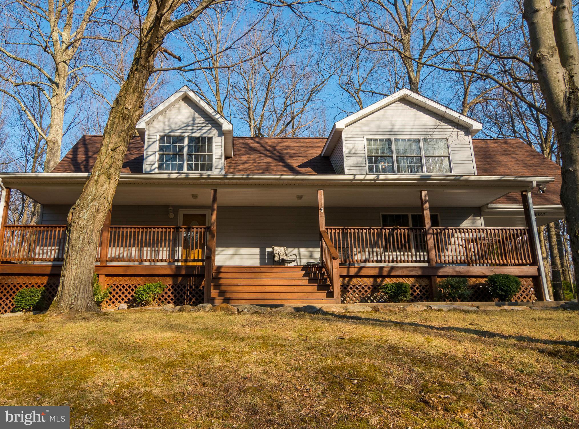 8807 Indian Springs Road Frederick, MD 21702 - Photo 2 of 27 front view of a house with a yard