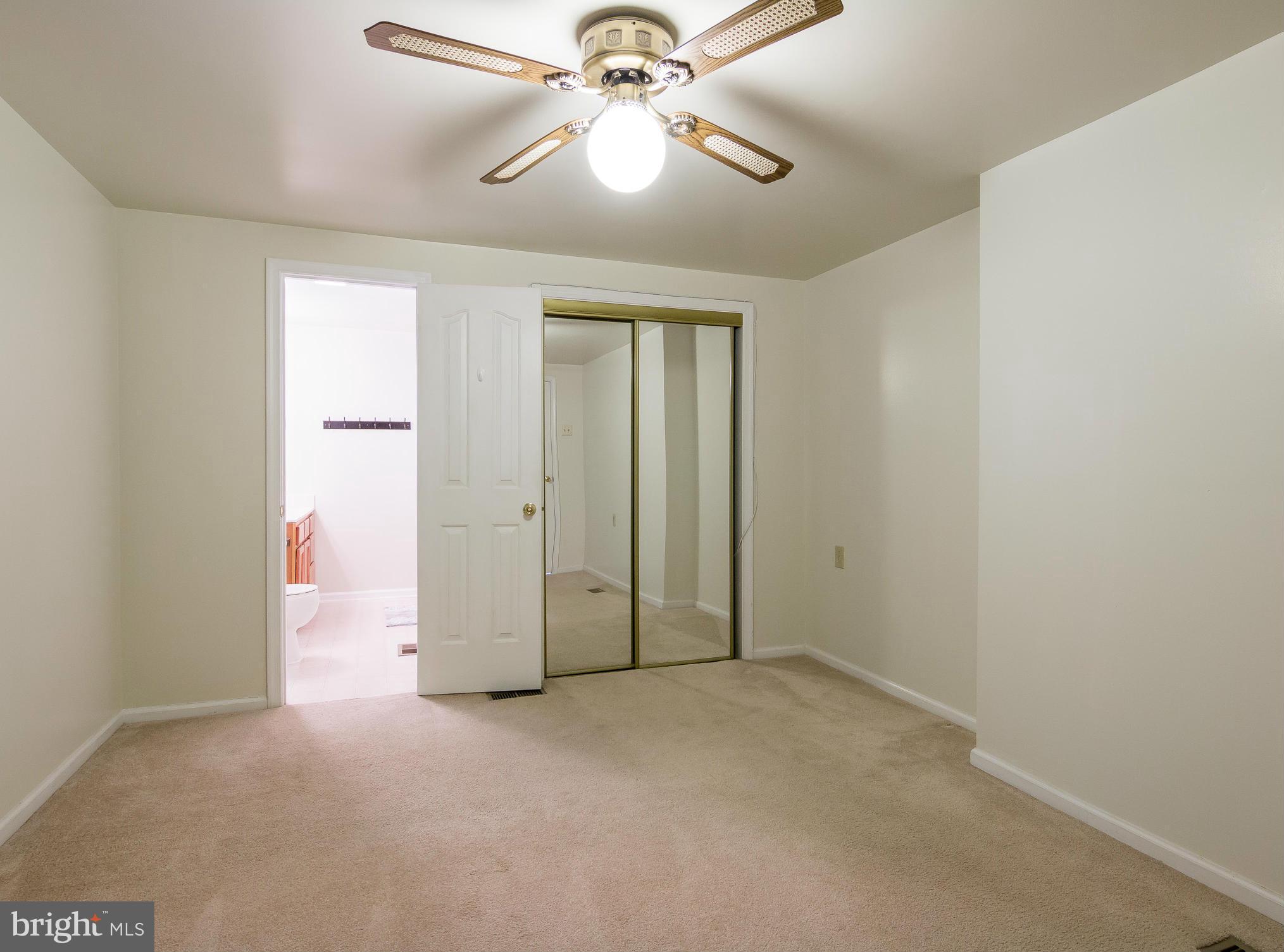 8807 Indian Springs Road Frederick, MD 21702 - Photo 14 of 27 wooden floor in an empty room