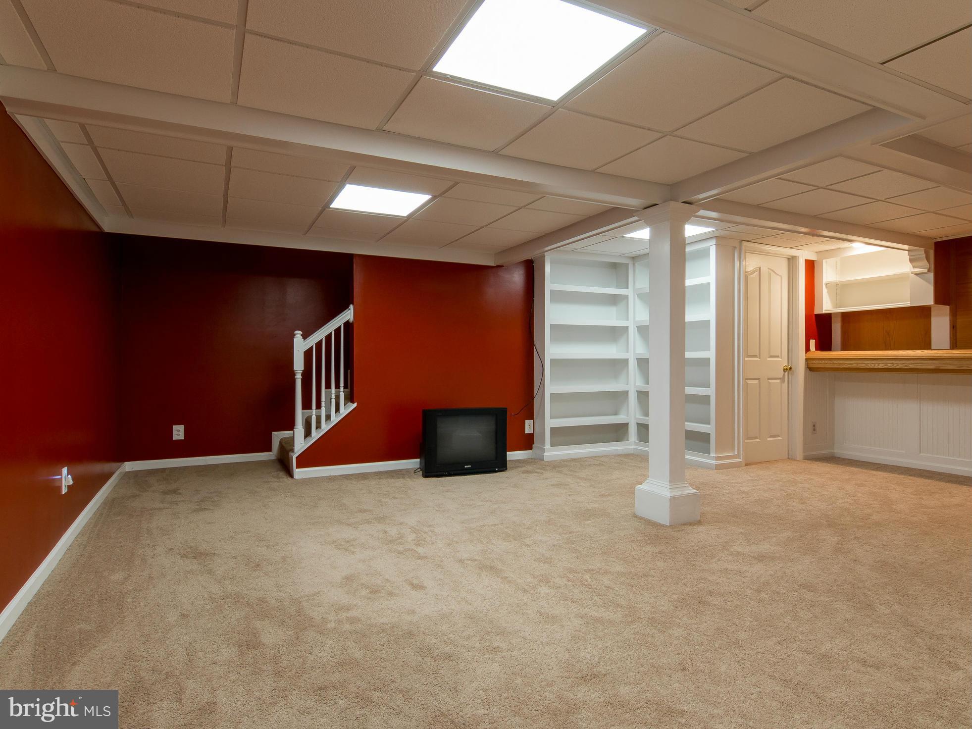 8807 Indian Springs Road Frederick, MD 21702 - Photo 22 of 27 a view of an empty room with a fireplace