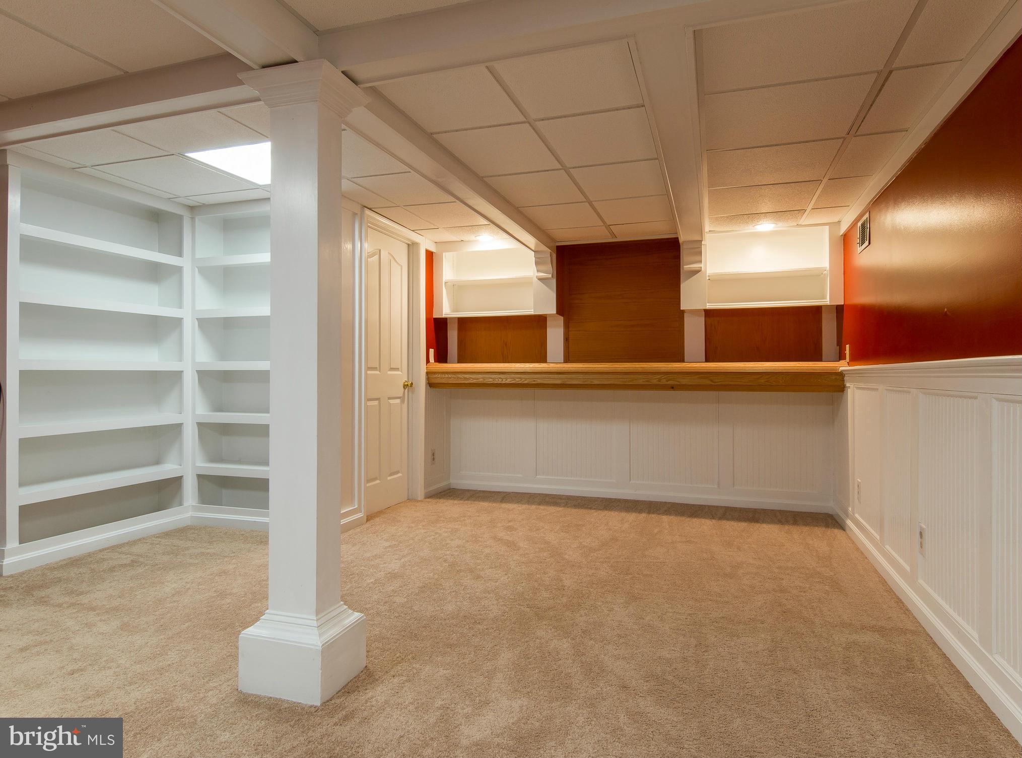8807 Indian Springs Road Frederick, MD 21702 - Photo 23 of 27 a view of empty room with wooden floor and windows