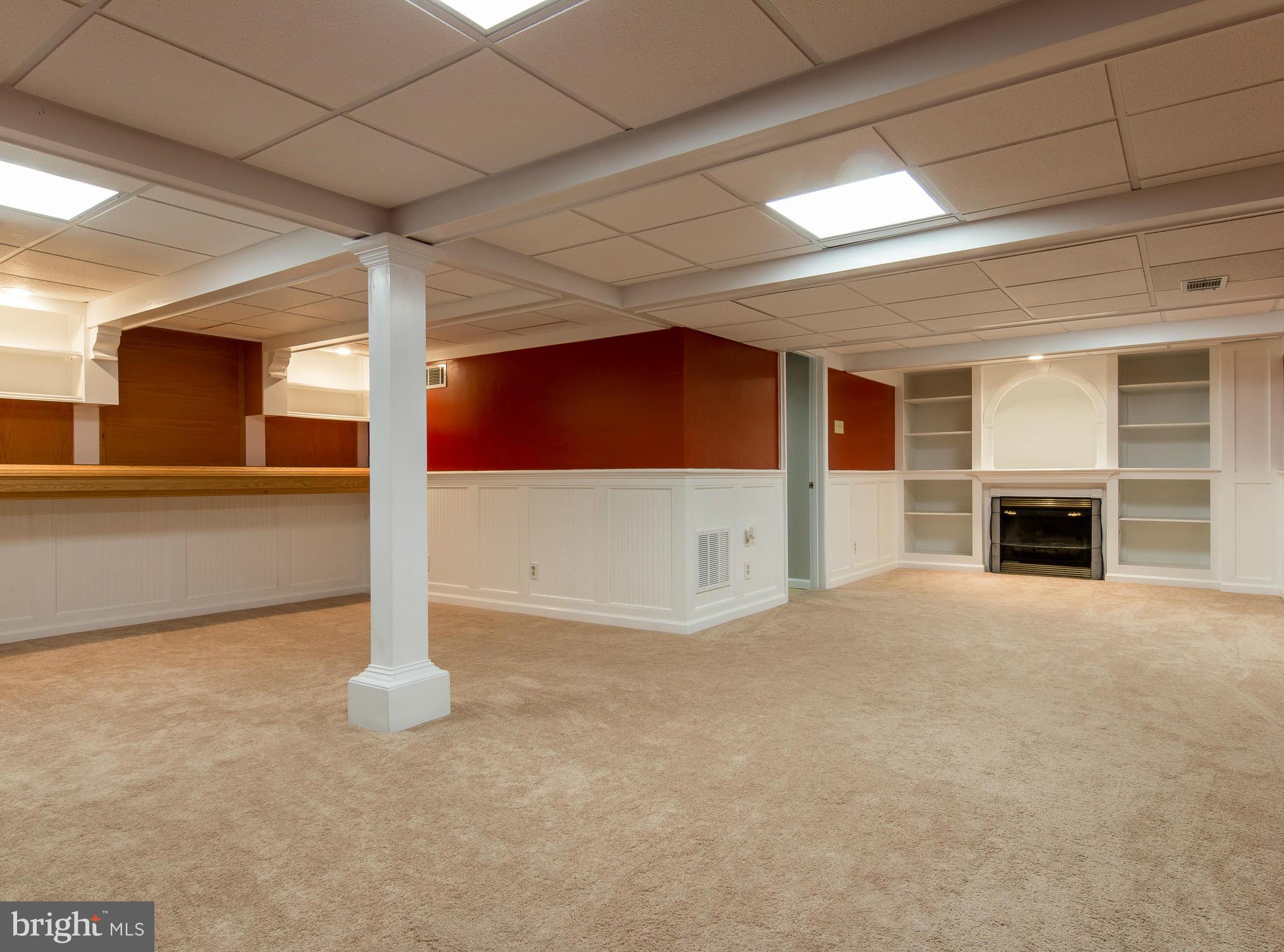 8807 Indian Springs Road Frederick, MD 21702 - Photo 24 of 27 a view of an empty room with a fireplace