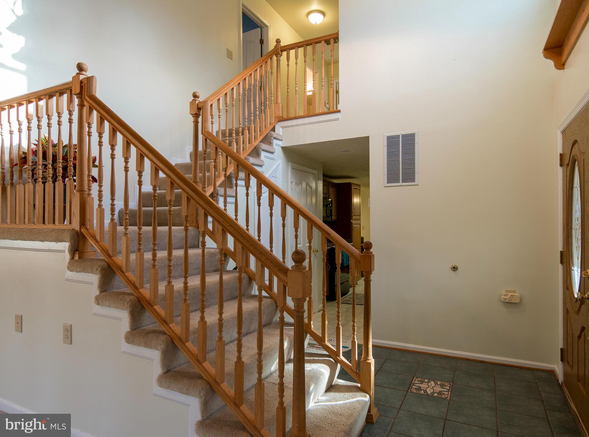 8807 Indian Springs Road Frederick, MD 21702 - Photo 6 of 27 a view of entryway with wooden floor