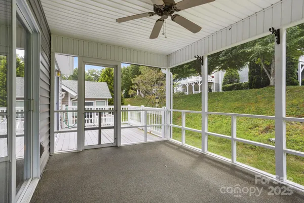a view of a porch with wooden floor and outdoor space