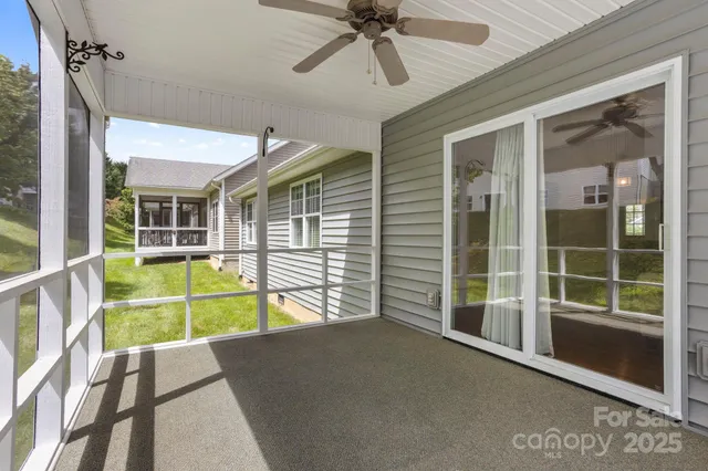 a view of an empty room with a balcony