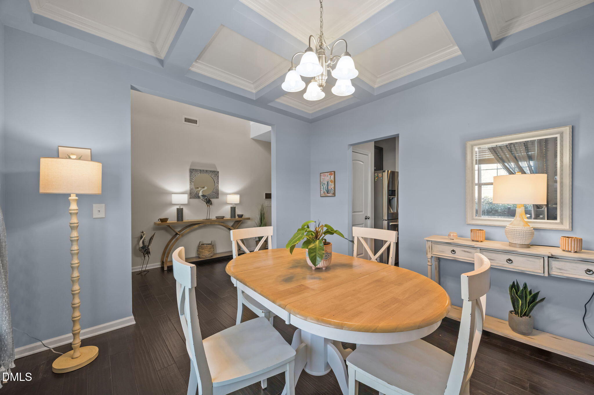 2329 Longshadow Drive Graham, NC 27253 - Photo 16 of 52 a view of a dining room with furniture and wooden floor