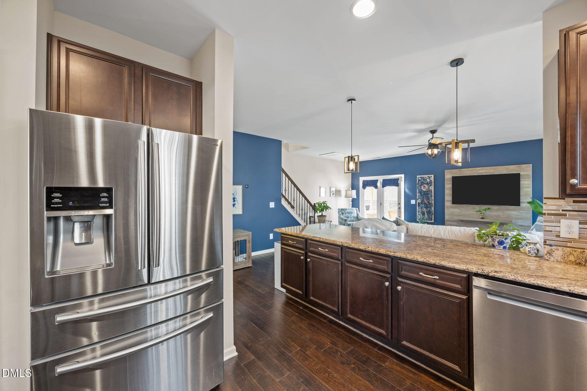 2329 Longshadow Drive Graham, NC 27253 - Photo 20 of 52 a kitchen with stainless steel appliances granite countertop a refrigerator and a sink