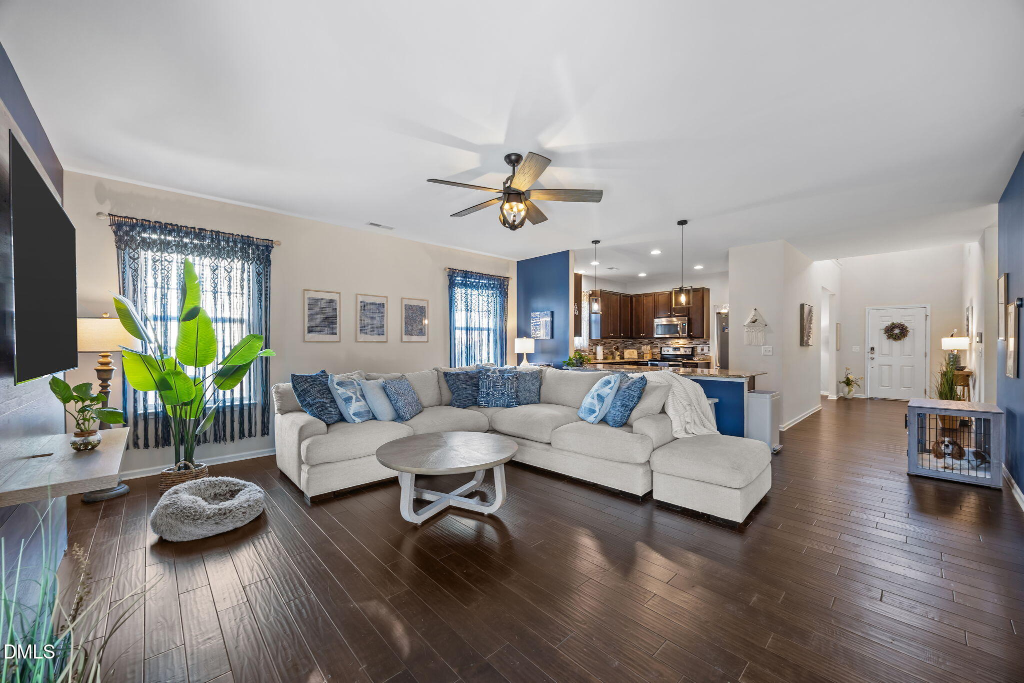 2329 Longshadow Drive Graham, NC 27253 - Photo 24 of 52 a living room with furniture and a wooden floor