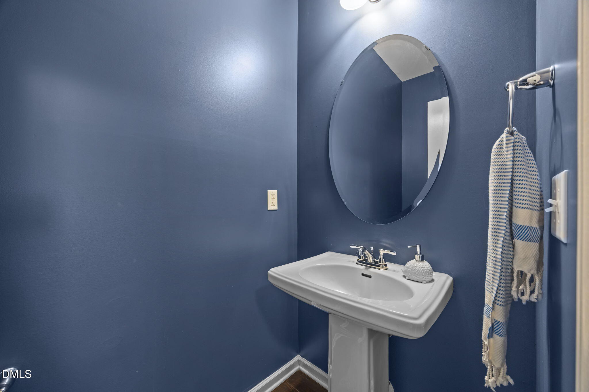 2329 Longshadow Drive Graham, NC 27253 - Photo 25 of 52 a bathroom with a sink and a mirror