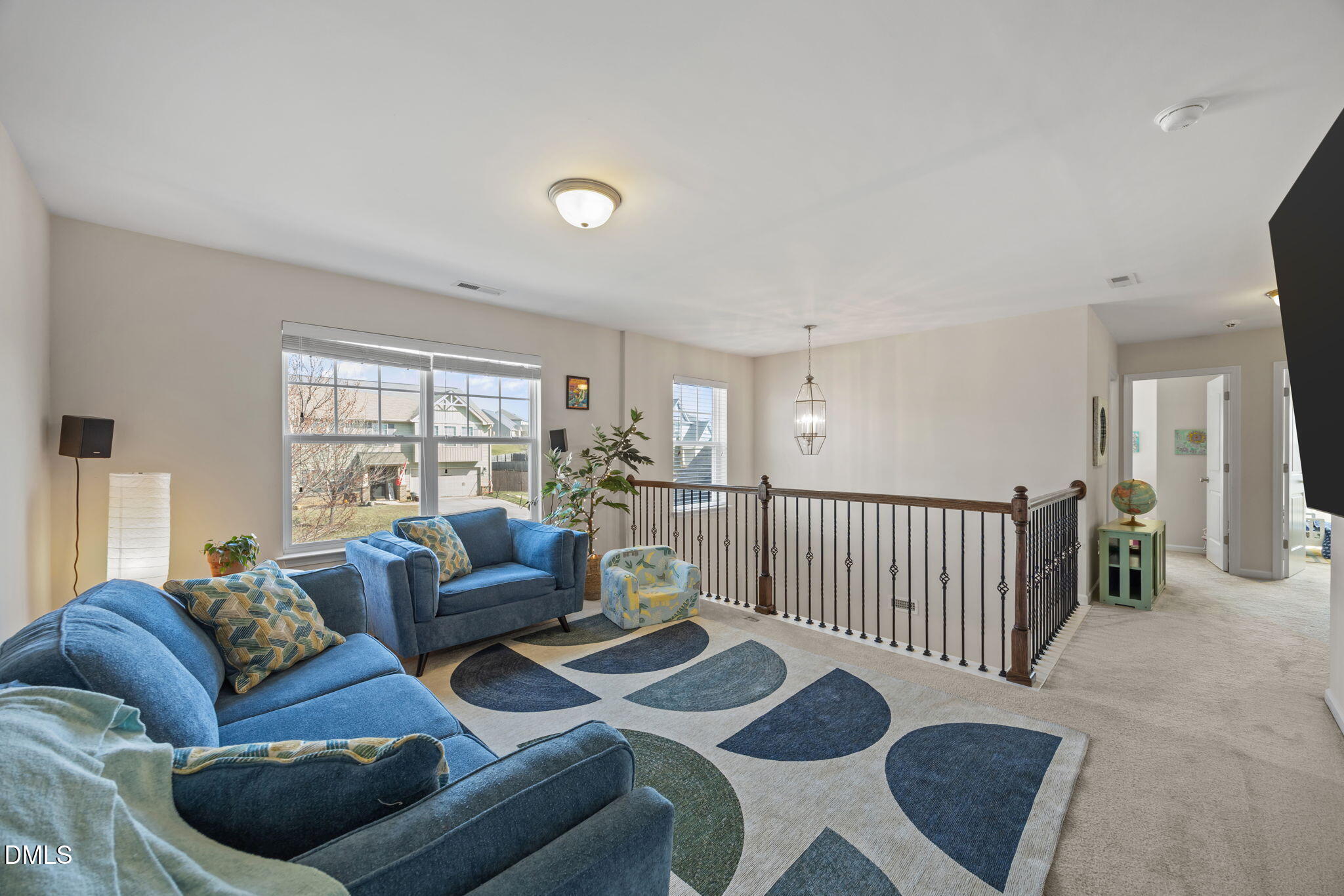 2329 Longshadow Drive Graham, NC 27253 - Photo 31 of 52 a living room with furniture and a window