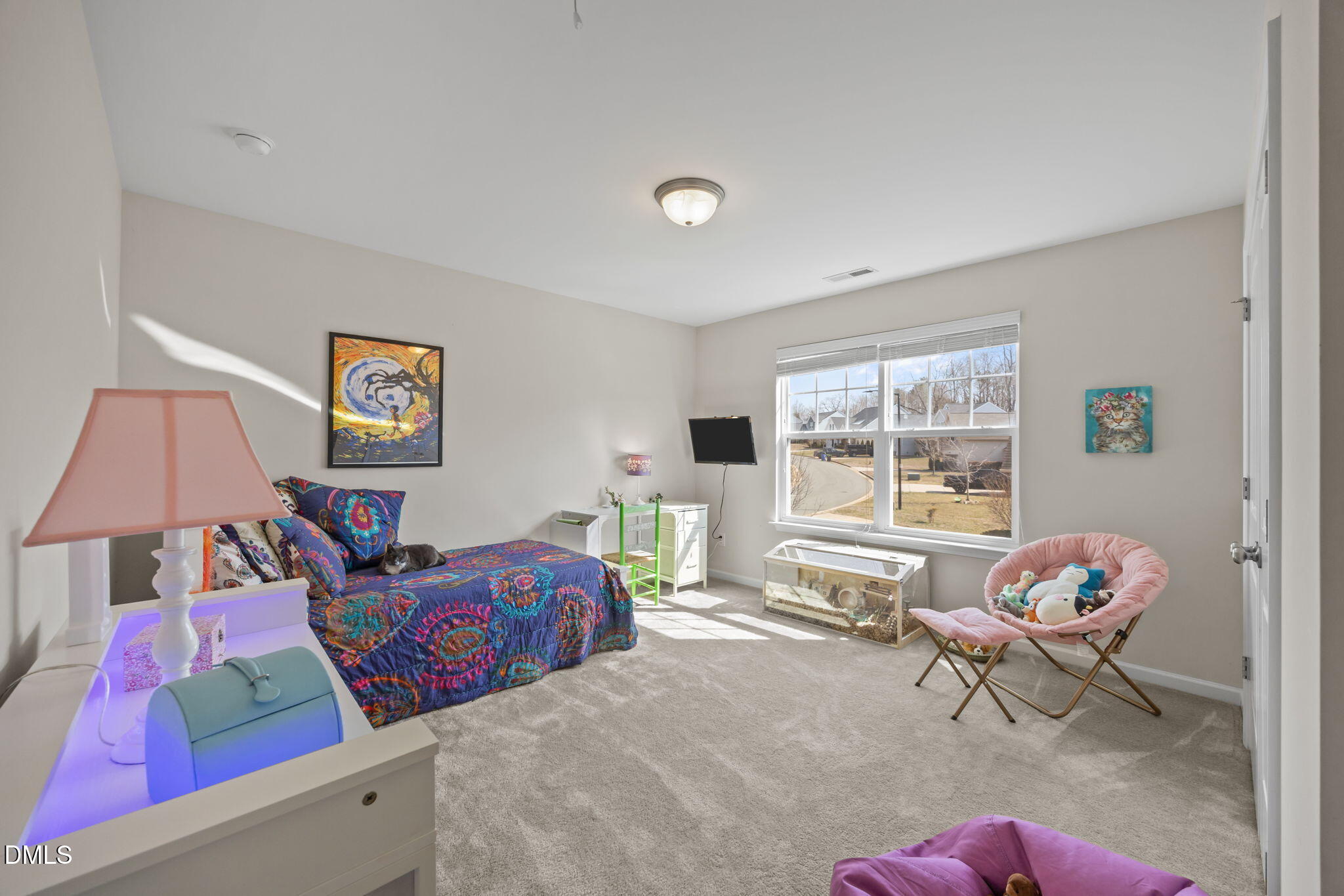 2329 Longshadow Drive Graham, NC 27253 - Photo 39 of 52 a living room with furniture and a window